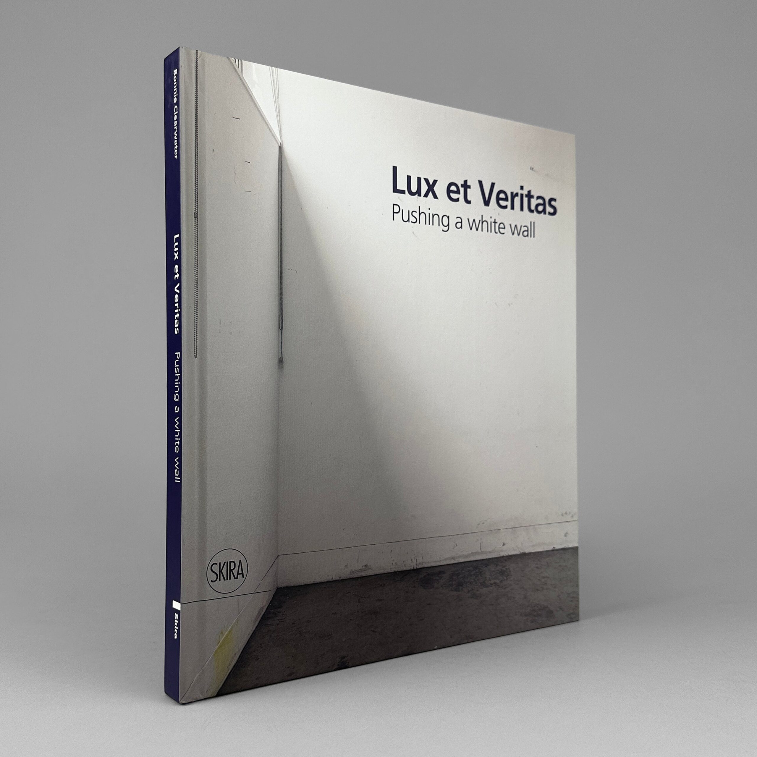 Lux et Veritas: Pushing a White Wall
